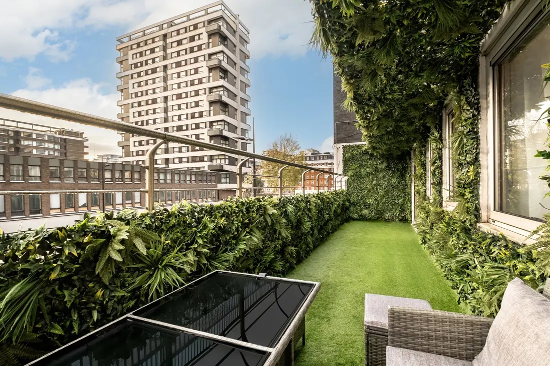 The balcony lawn with views over the rooftops