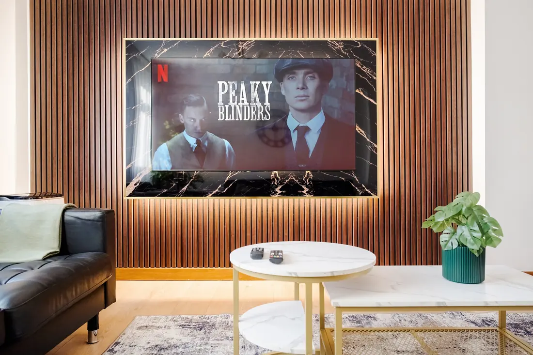 The TV wall, lit from behind